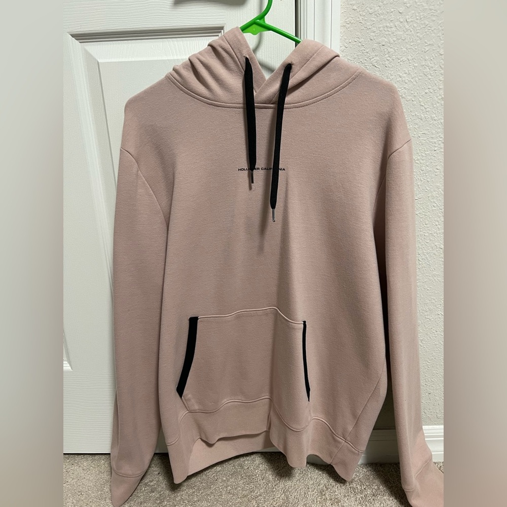 Hollister Men’s light pinkish hoodie